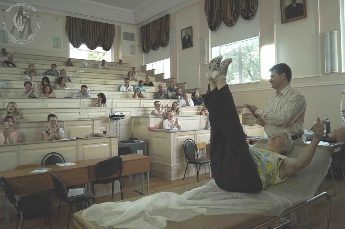 Andrei Efremov presenting research at a medical scientific conference